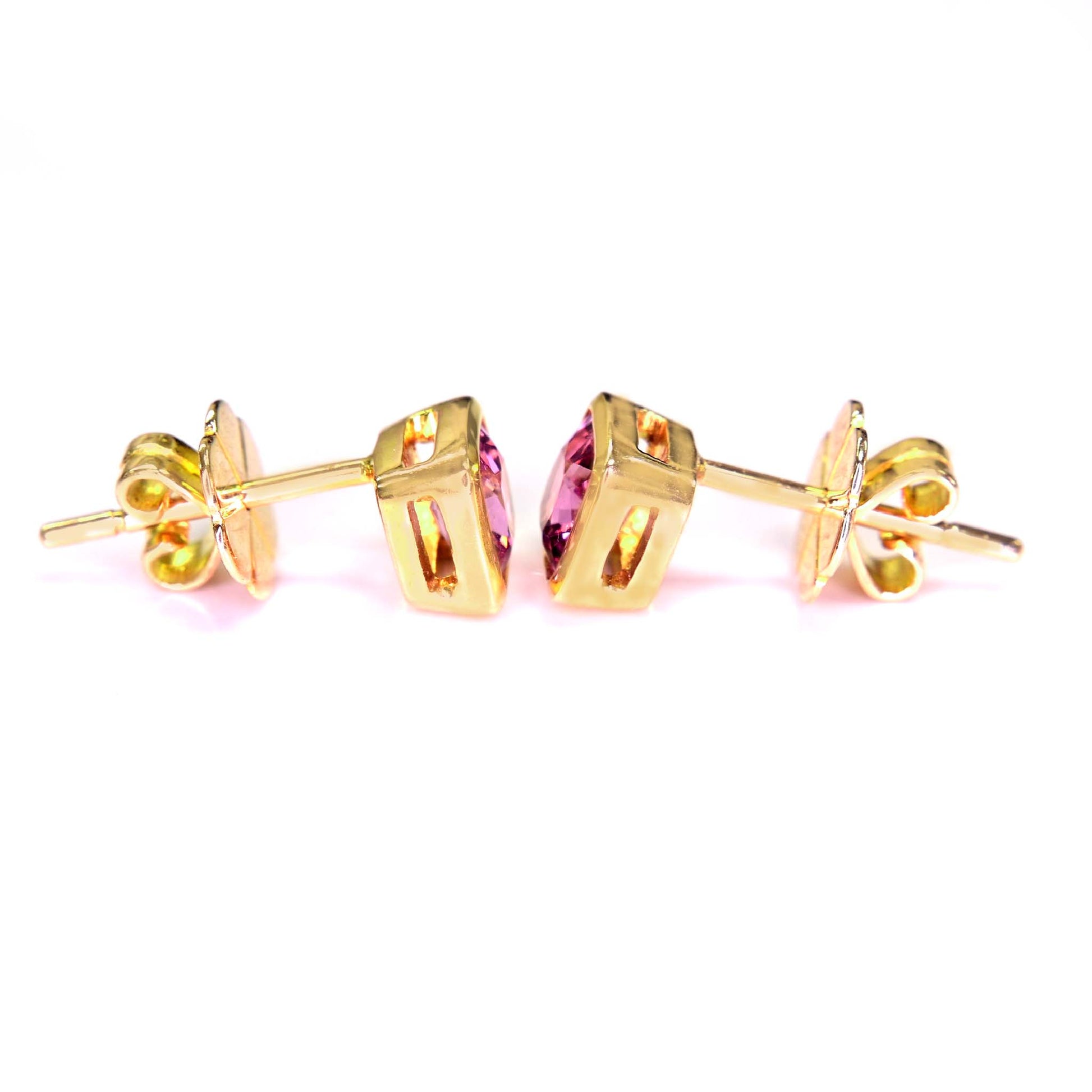 Handcrafted 14k yellow gold earrings with pink spinel stones, designed by Shiraz Jewelry