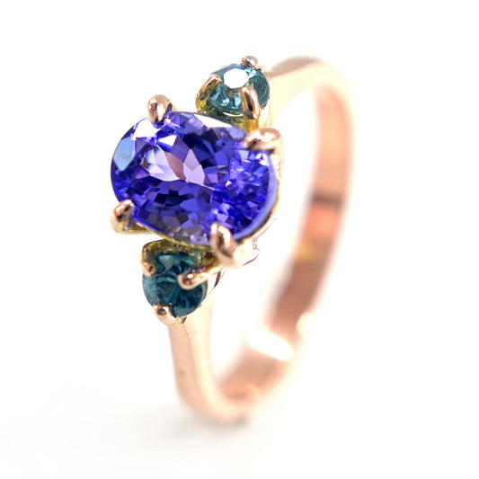 Sparkly tanzanite ring with two Thai Blue Zircon from Shiraz Jewelry in Chiang Mai, Thailand