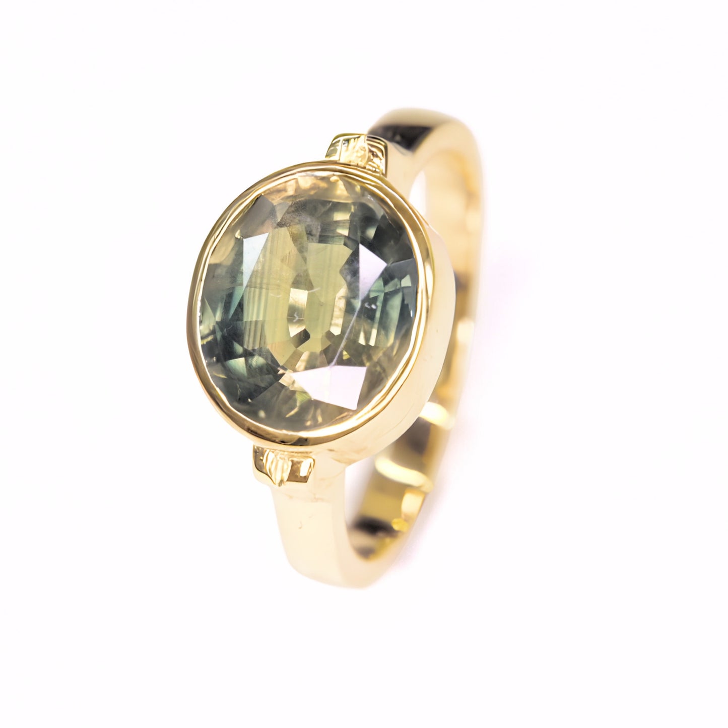 3.70 carat natural green sapphire ring from Thailand set in 14K yellow gold