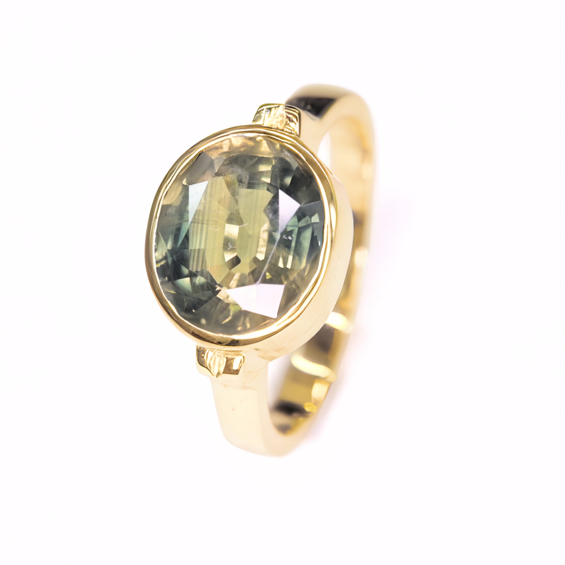 3.70 carat natural green sapphire ring from Thailand set in 14K yellow gold