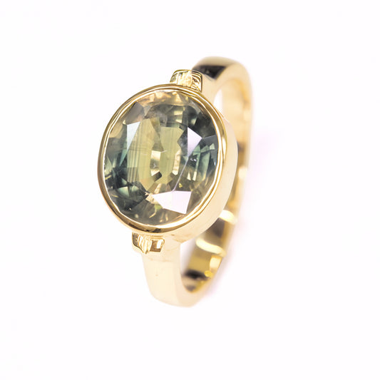 3.70 carat natural green sapphire ring from Thailand set in 14K yellow gold