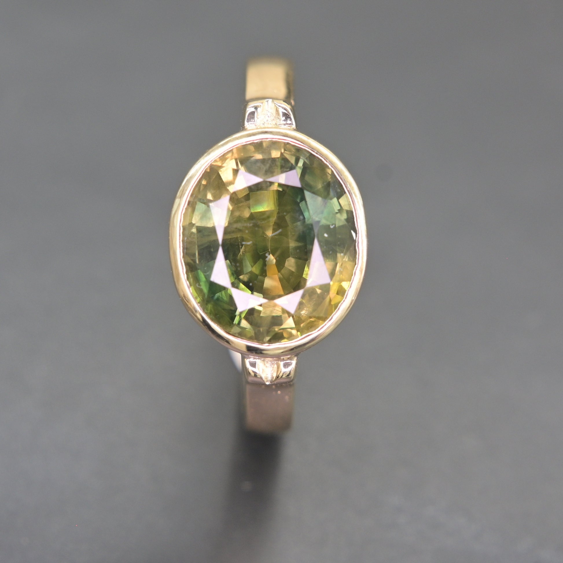 Elegant green sapphire statement ring crafted in 14K yellow gold