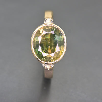 Elegant green sapphire statement ring crafted in 14K yellow gold