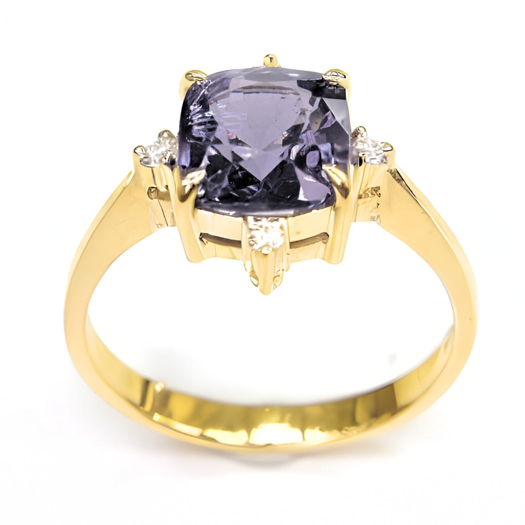 A dynamic image capturing the brilliance of the natural diamonds and the captivating color play of the unheated lavender grey spinel as light interacts with its facets.