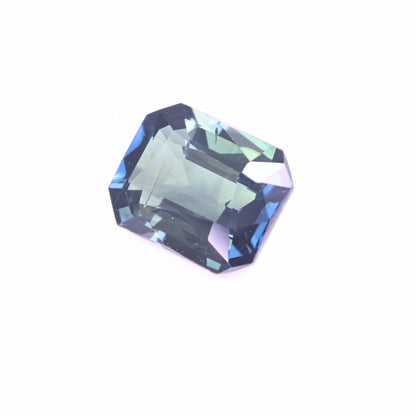 Octagon cut blue green sapphire 2.12 ct unheated on white background