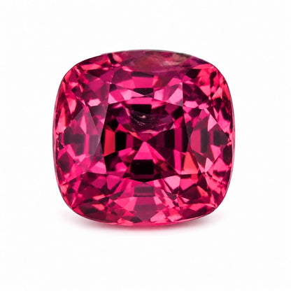 2.05 carat unheated Mozambique ruby cushion cut loose gemstone with vivid natural red color on white background.