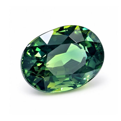 Close-up of oval-cut no-heat Thai green sapphire showing brilliant natural sparkle