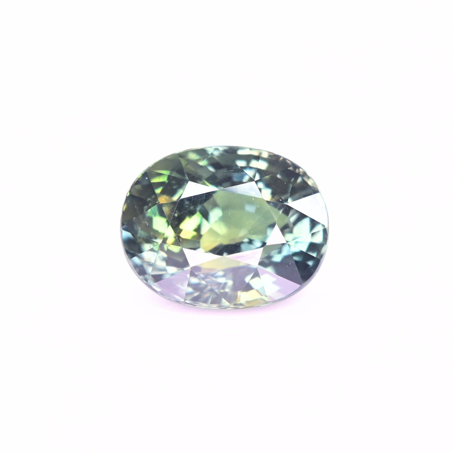Unheated blue-green sapphire 5.03 carat oval cut with natural teal color