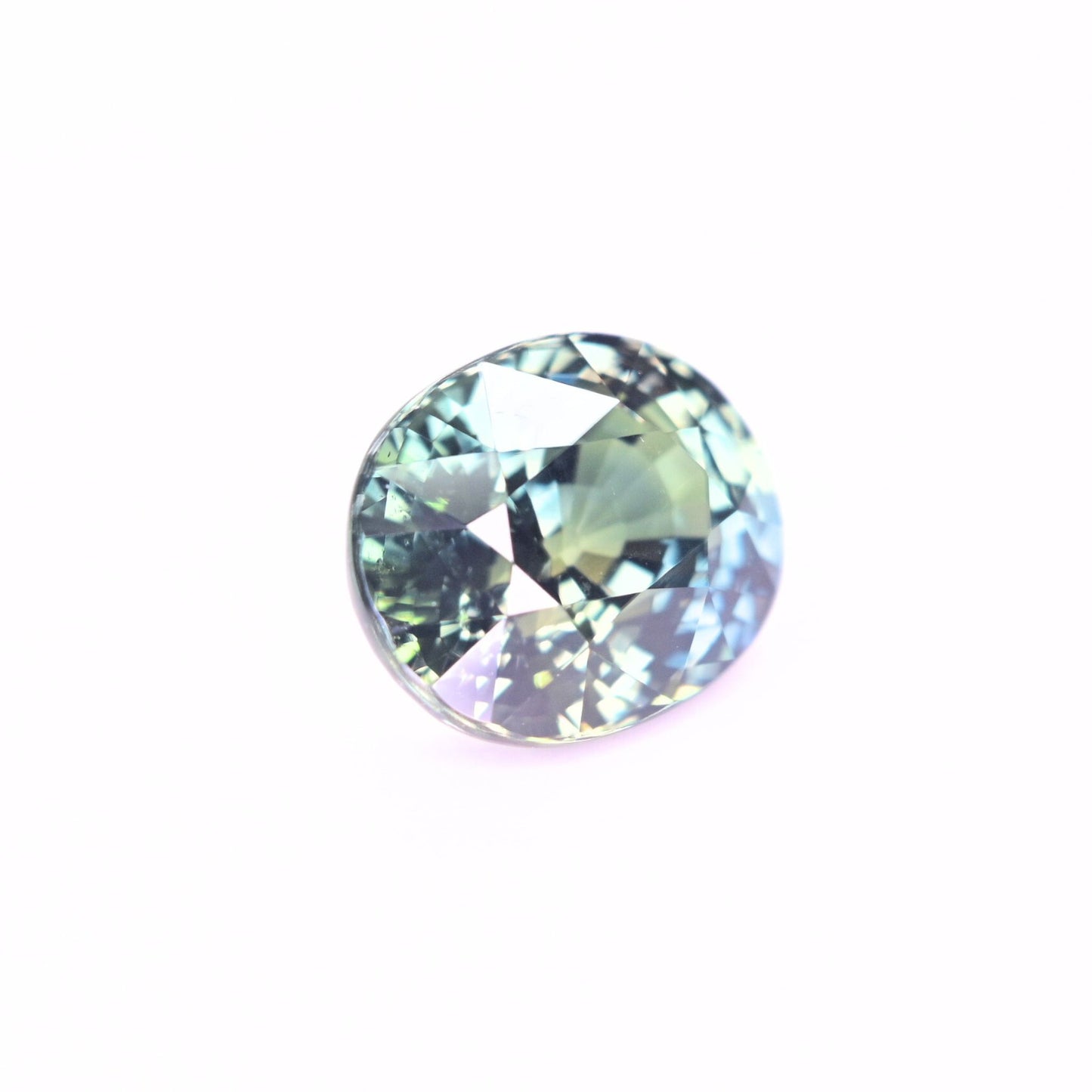 Natural unheated sapphire 5.03 carat oval teal gemstone close-up