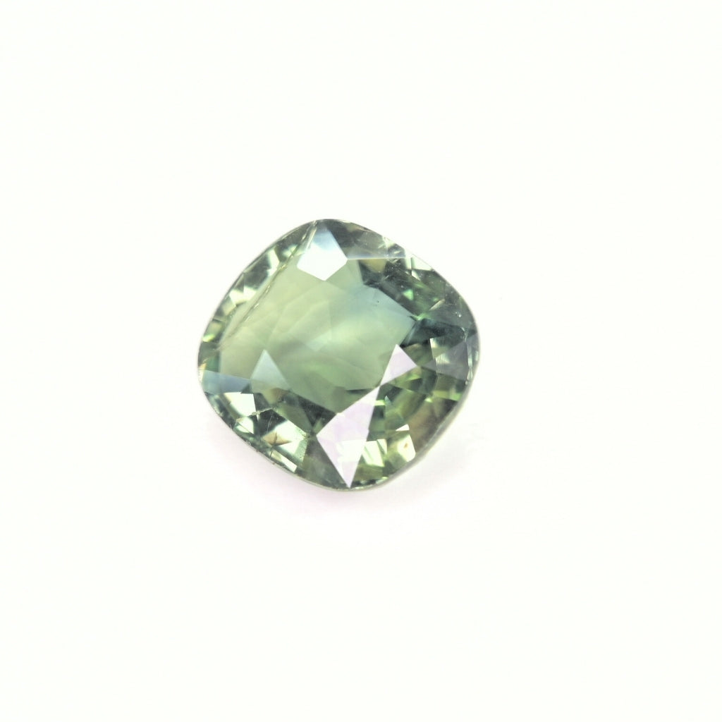 Cushion cut unheated green sapphire for custom ring
