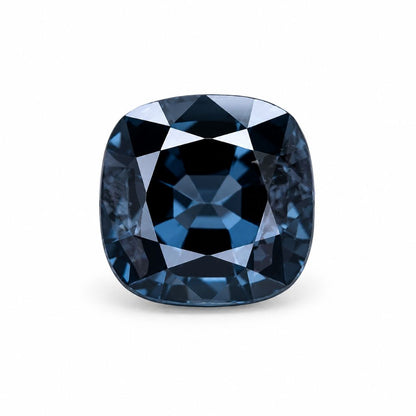 Unheated cushion-cut blue spinel gemstone with deep blue color, natural loose stone available in Chiang Mai, Thailand.
