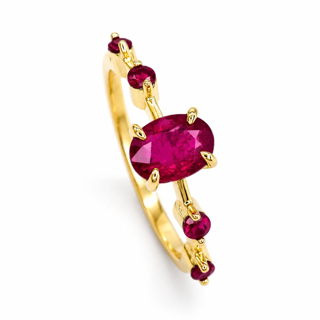 Fine jewelry ruby ring with oval-cut natural ruby and ruby accent stones available in Chiang Mai, Thailand