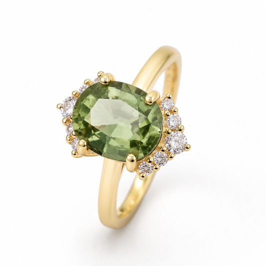 Handcrafted mint green Thai sapphire engagement ring in 14K yellow gold
