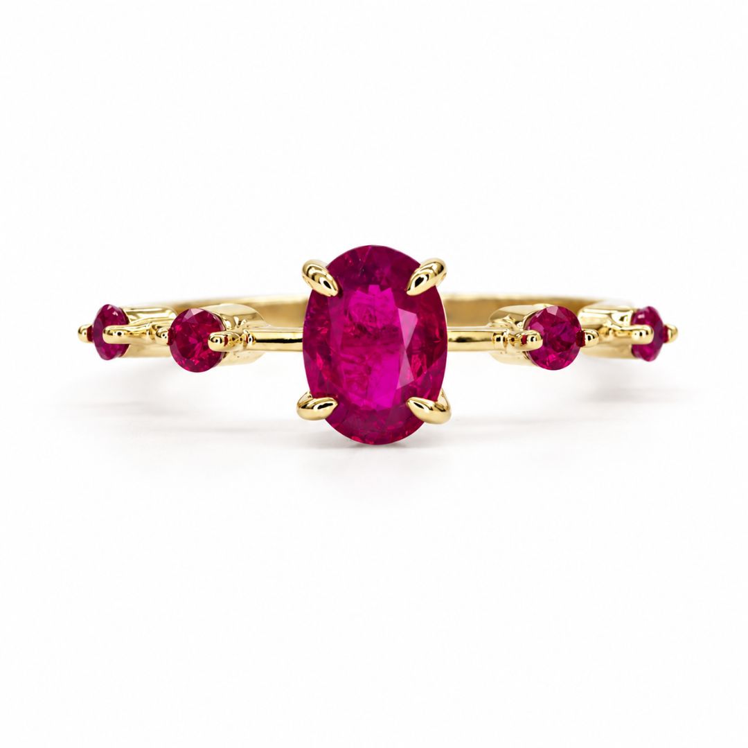 Natural ruby ring in 14K yellow gold with oval ruby and side ruby accents handcrafted in Chiang Mai, Thailand