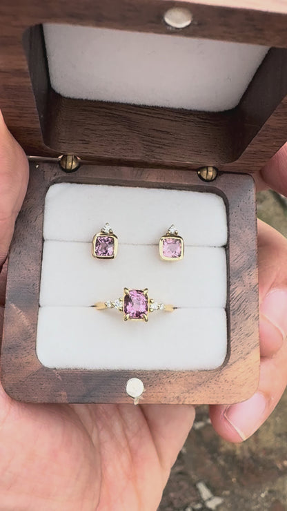 Fine jewelry pink spinel and diamond stud earrings handcrafted in solid 14K yellow gold in Chiang Mai, Thailand.