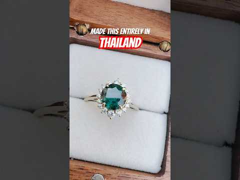 Luxury green sapphire diamond halo ring featuring natural Thai sapphire in 18k white gold