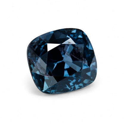 Natural unheated blue spinel loose gemstone in cushion cut, rich steel-blue color from Shiraz Jewelry Chiang Mai.