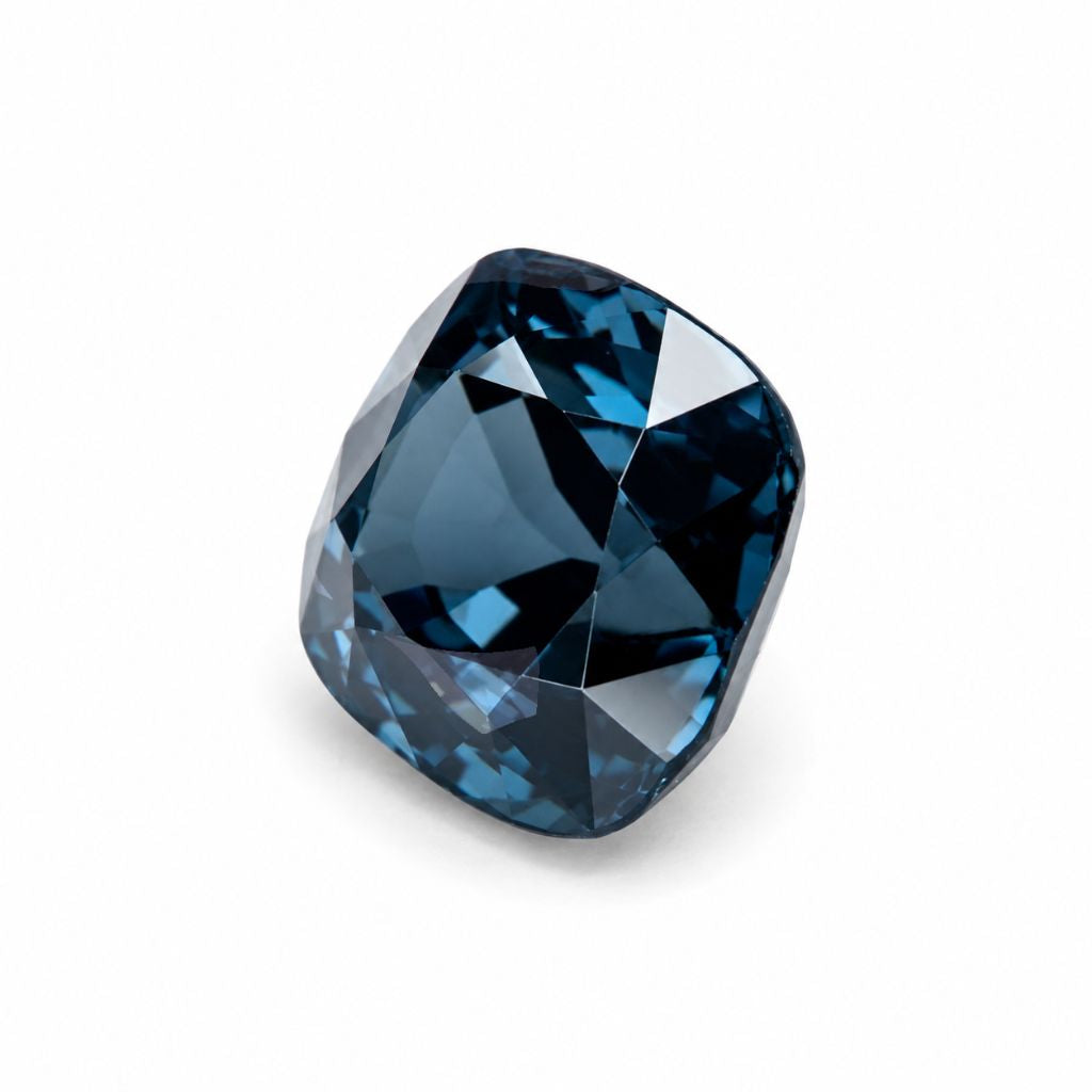 Close-up of a natural unheated blue spinel gemstone with cushion cut, ideal for custom engagement rings and fine jewelry in Chiang Mai.