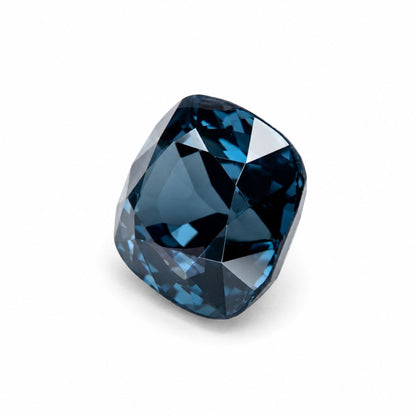 Close-up of a natural unheated blue spinel gemstone with cushion cut, ideal for custom engagement rings and fine jewelry in Chiang Mai.