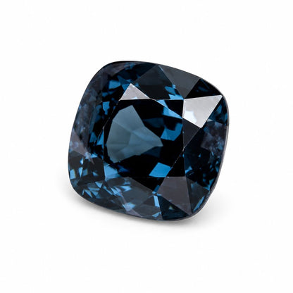 Rare unheated blue spinel loose gemstone with elegant cushion cut, handcrafted jewelry stone available from Shiraz Jewelry Chiang Mai, Thailand.