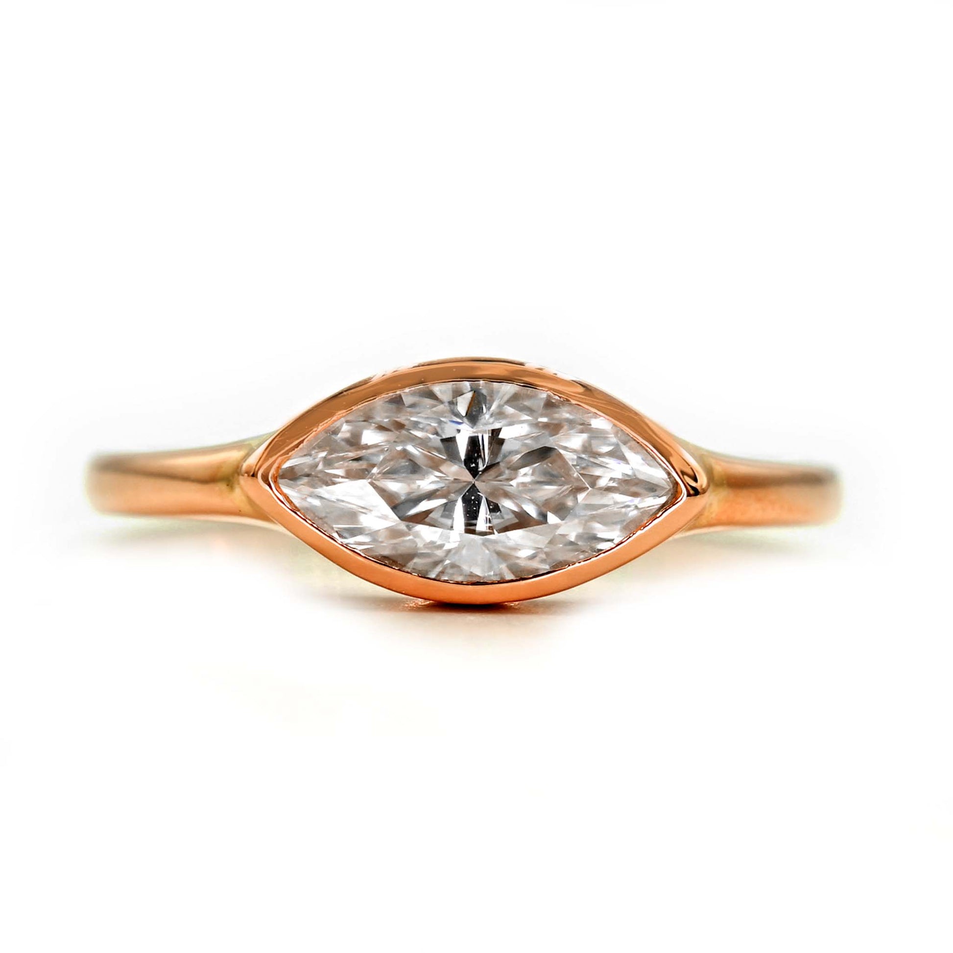 Marquise engagement ring handmade with earth-friendly moissanite and 14k rose gold. Available from Shiraz Jewelry in Chiang Mai, Thailand