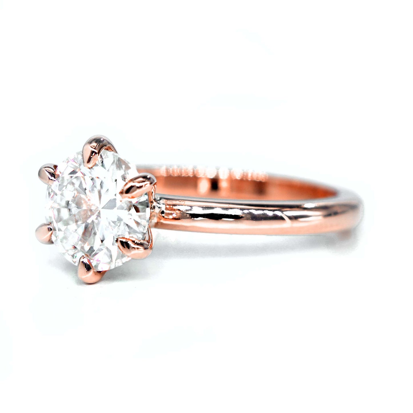 Hand-select moissanite engagement ring in 14k rosegold