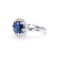Showing twisted band design view of our handmade blue sapphire ring with diamond halo