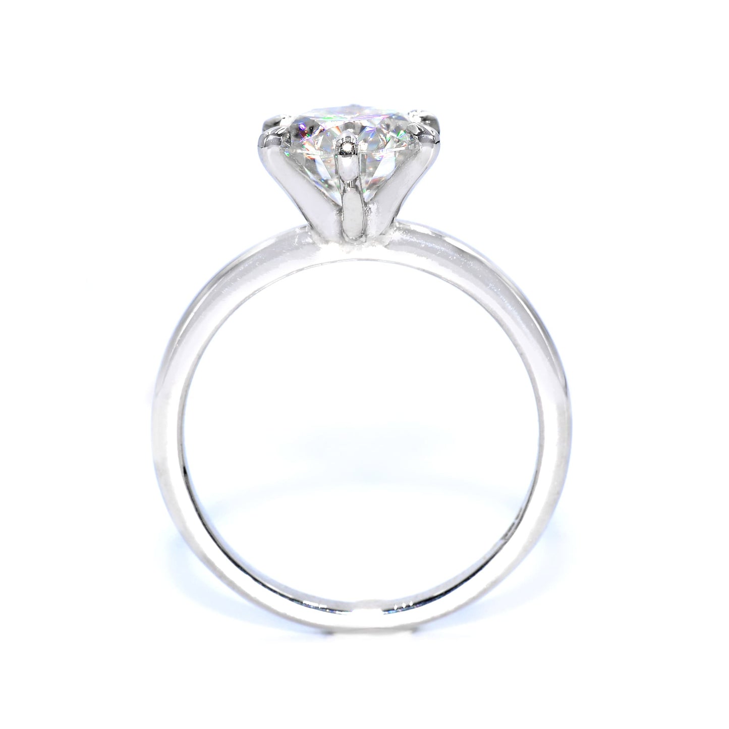 Side view of handcrafted engagement ring in 18k white gold