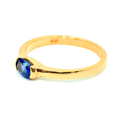 This natural blue sapphire ring is perfect for everyday wear. Handmade in Chiang Mai, Thailand, with 18K yellow gold