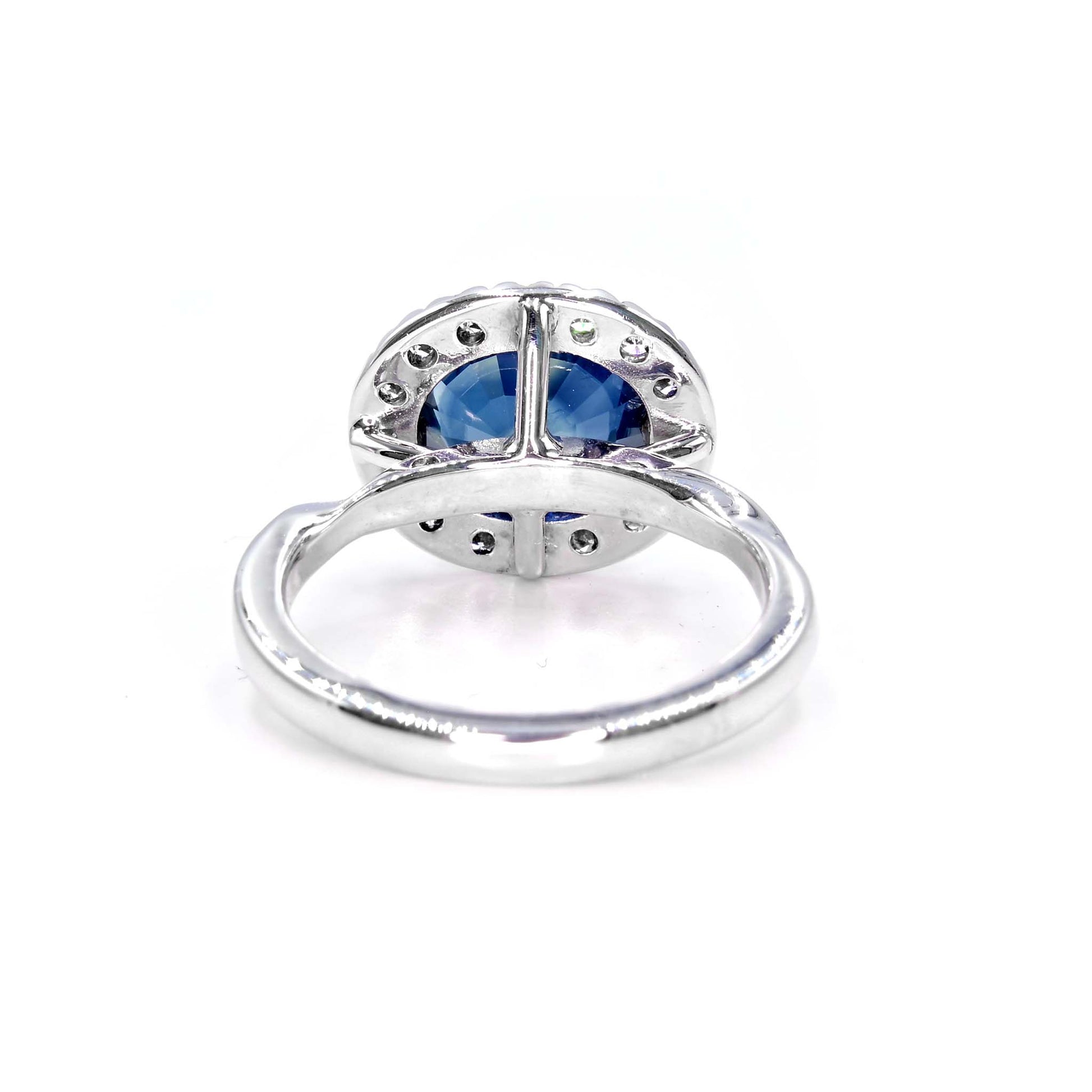 One-of-a-kind handmade ring in Chiang Mai, Thailand featuring large size blue sapphire and diamonds