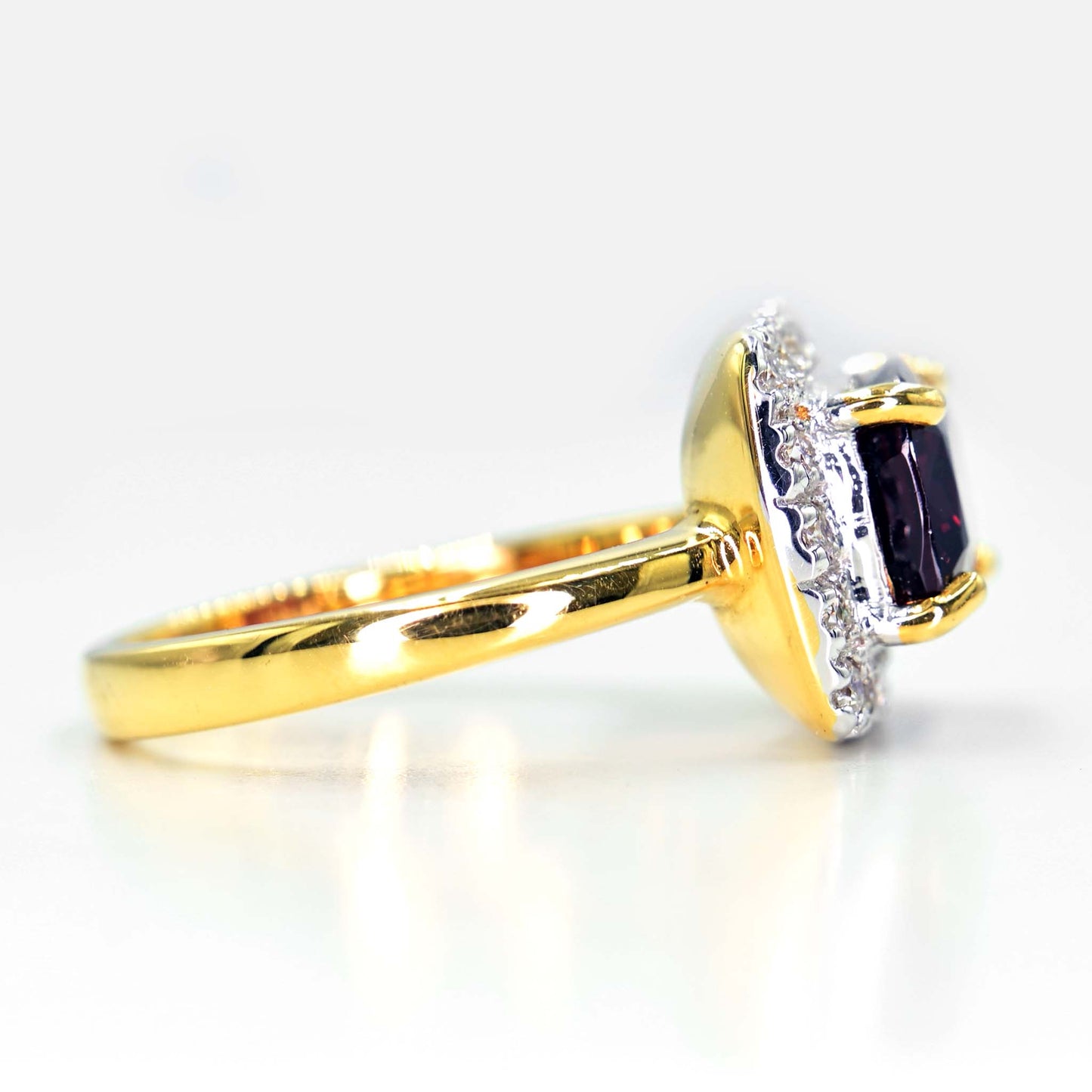 Yellow and white gold rhodolite ring