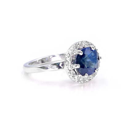 Solid handmade ring with blue sapphire and diamonds
