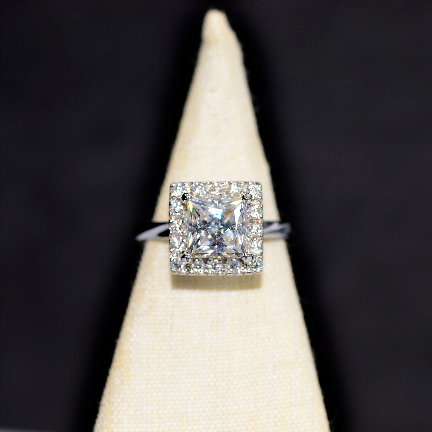 A handmade engagement ring with moissanite
