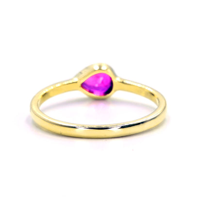 Unique pear cut ruby engagement ring in 14K gold