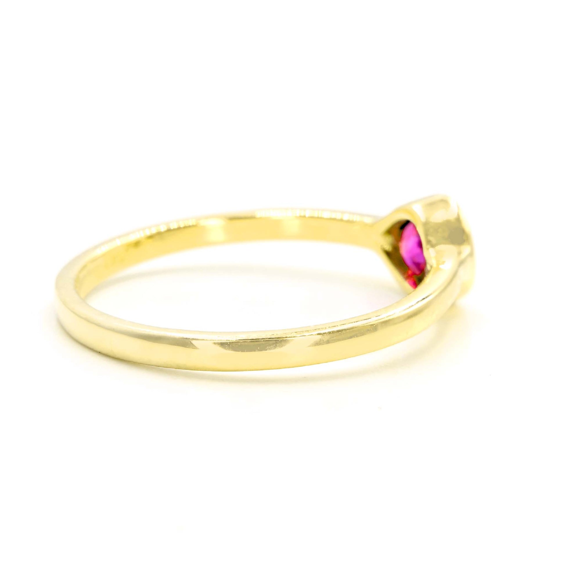 Handmade ruby ring with bezel setting in 14 karat gold