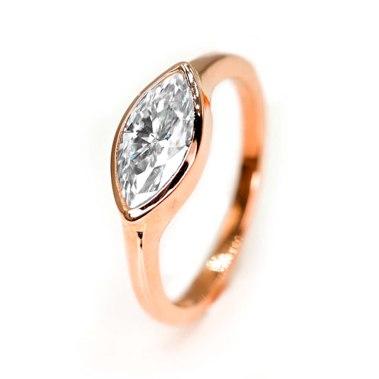 Marquise engagement ring handmade with earth-friendly moissanite and 14k rose gold
