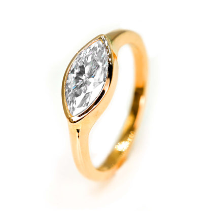 Affordable handmade marquise engagement ring with moissanite in 14k yellow gold