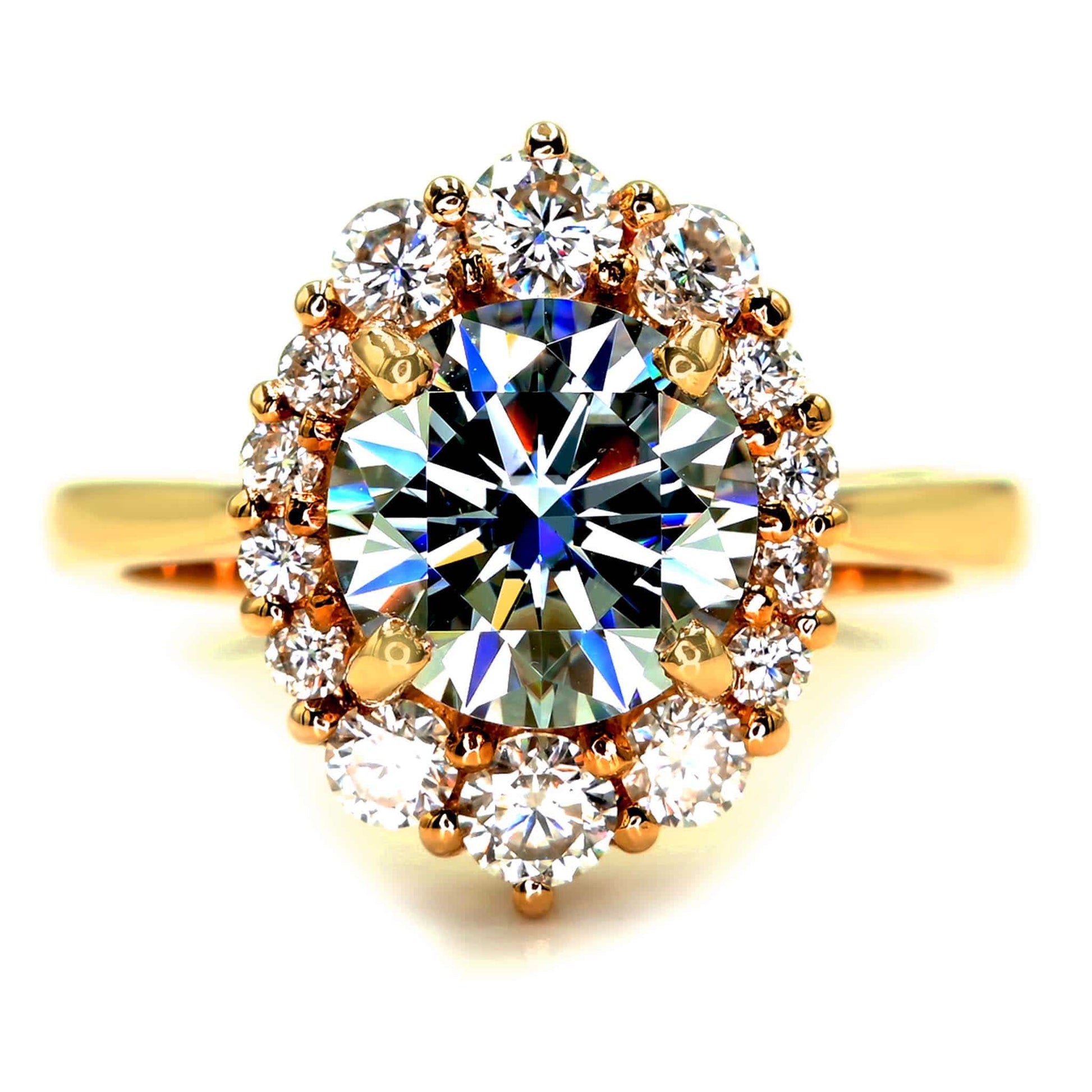 The orion ring with grey moissanite and 18k yellow gold. The handmade moissanite ring is available made-to-order.
