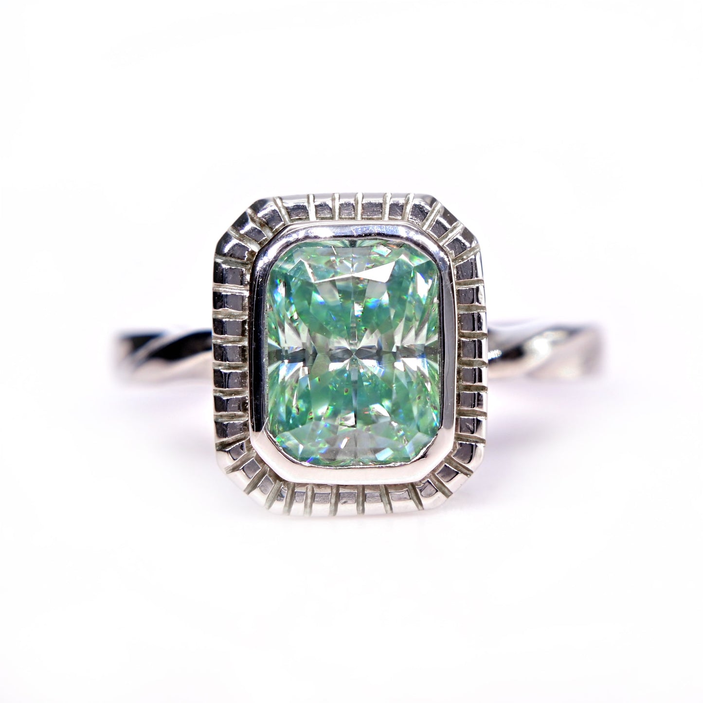 Shiraz Jewelry blue green moissanite ring with rectangular cut stone and white gold band