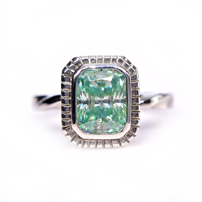 Shiraz Jewelry blue green moissanite ring with rectangular cut stone and white gold band