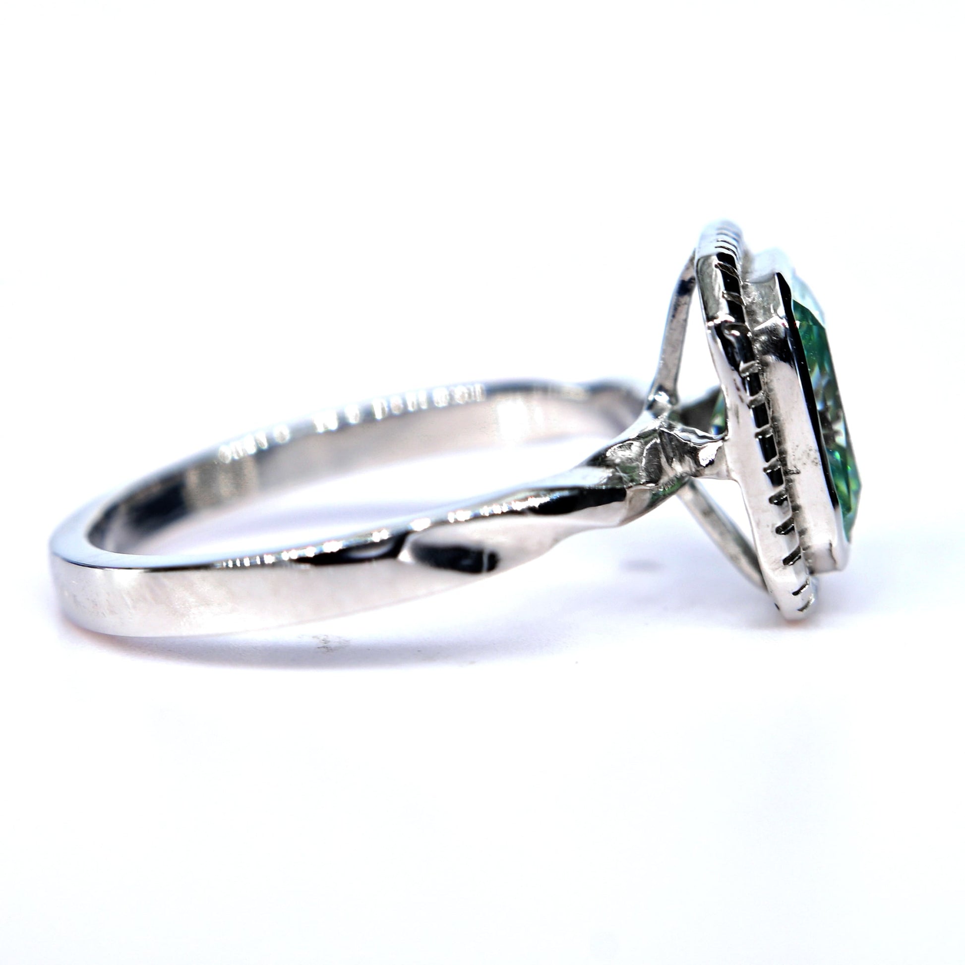 Shiraz Jewelry silver ring featuring a blue green moissanite ring gemstone set in a delicate band